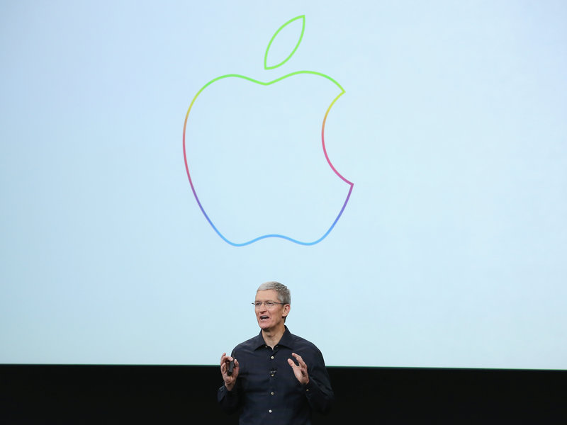 Apple CEO Tim Cook speaks during an event at Apple's headquarters Oct. 16, 2014 in Cupertino, California.